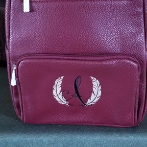 New boutique merlot backpack